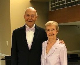 senior couple dressed in formal wear