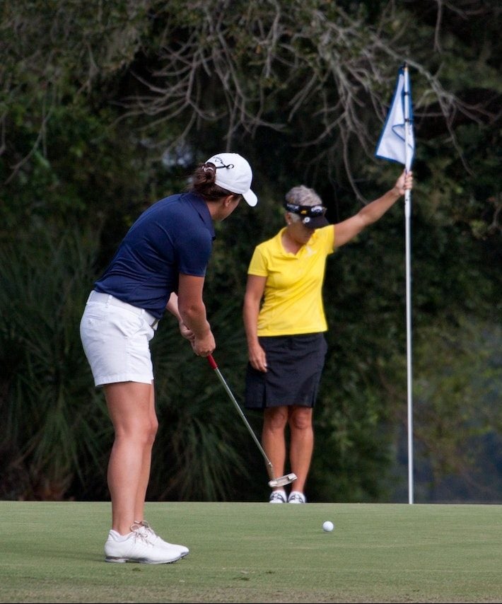 two women on a putting green